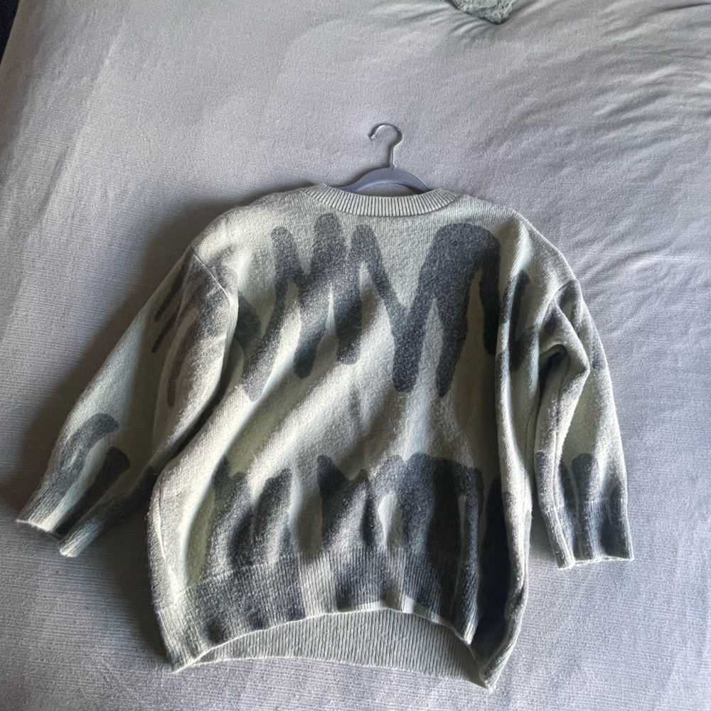 Green knitted crew neck sweater